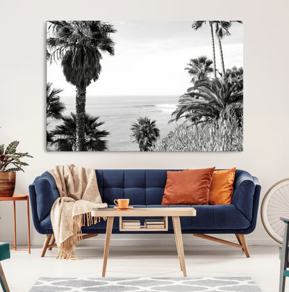 Monochrome canvas of palm trees framing a coastal surf scene, perfect for California-inspired or retro black-and-white beach decor.