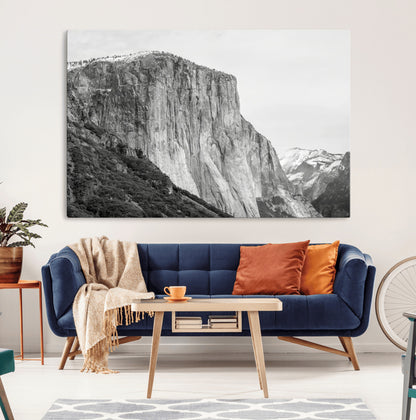 Monochrome canvas of El Capitan’s granite wall in Yosemite with snowy peaks, ideal for dramatic mountain or black-and-white nature decor.