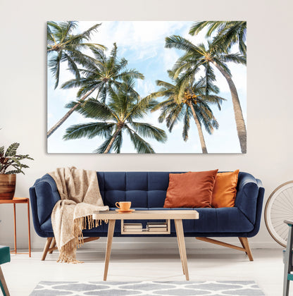 Framed canvas of tall palm trees reaching into a tropical sky, ideal for beach home or relaxed island-inspired wall decor.