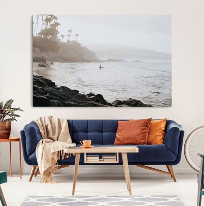 Framed canvas of a surfer in misty coastal tones at a foggy California beach, ideal for minimalist coastal beach or serene ocean-themed decor.