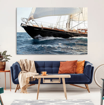 Close-up of a classic sailing yacht with wooden deck and full sails, perfect for nautical or coastal-style decor in ocean-themed spaces.