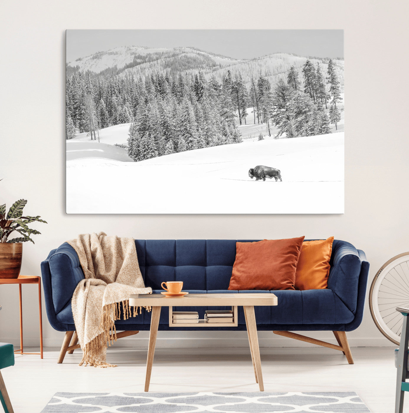 Snowy bison walking through white forest landscape, ideal for monochrome winter or wilderness-style interior wall decoration.