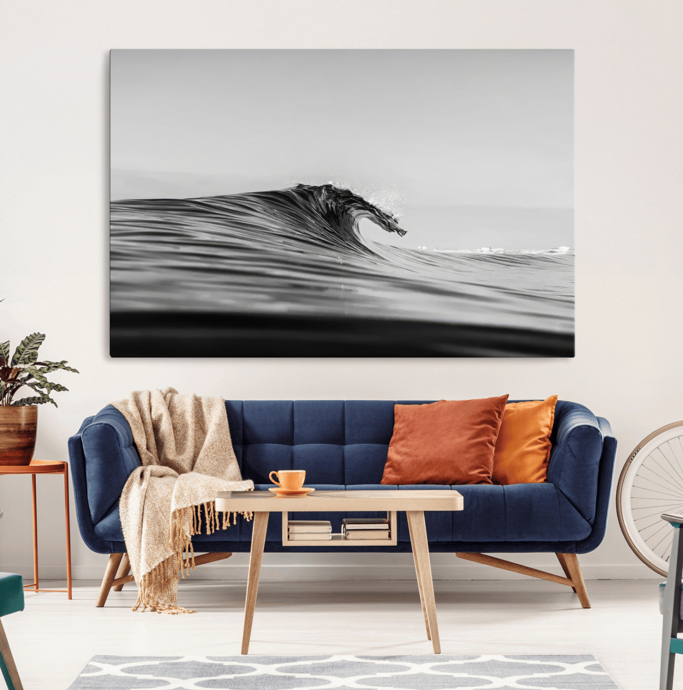 Striking black and white photo of a curling wave, ideal for modern coastal or minimalist wall decor settings.