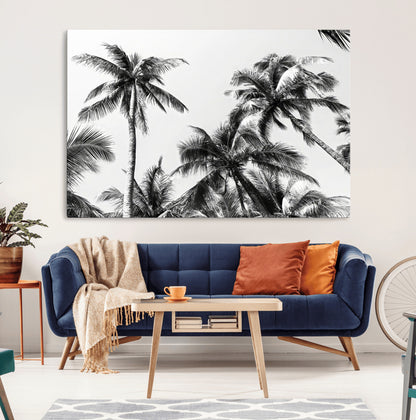 Black and white canvas of tall palm trees in moody tones, perfect for modern tropical minimalist or coastal-style home decor.