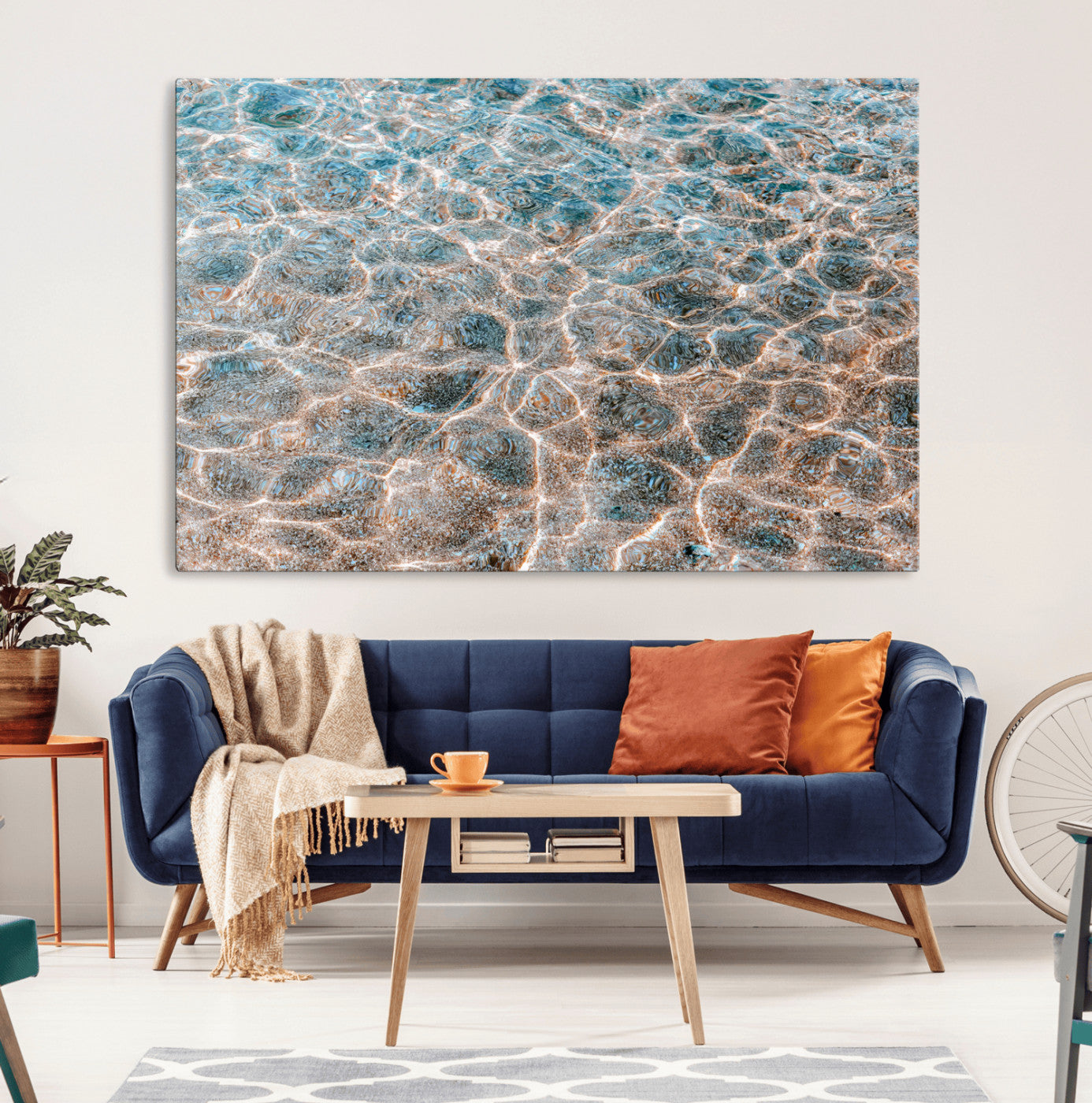Close-up of sunlit ocean ripples with aqua blue and golden tones, ideal for modern coastal or minimalist home decor.