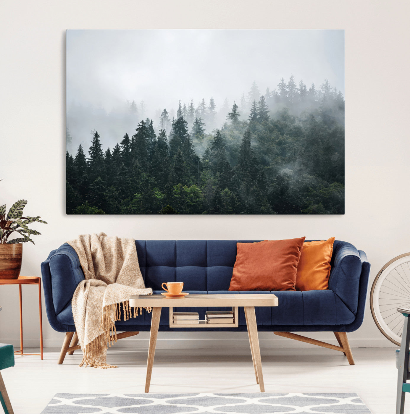 A misty evergreen forest shrouded in soft fog, creating a tranquil and moody landscape with lush green trees fading into the distance.