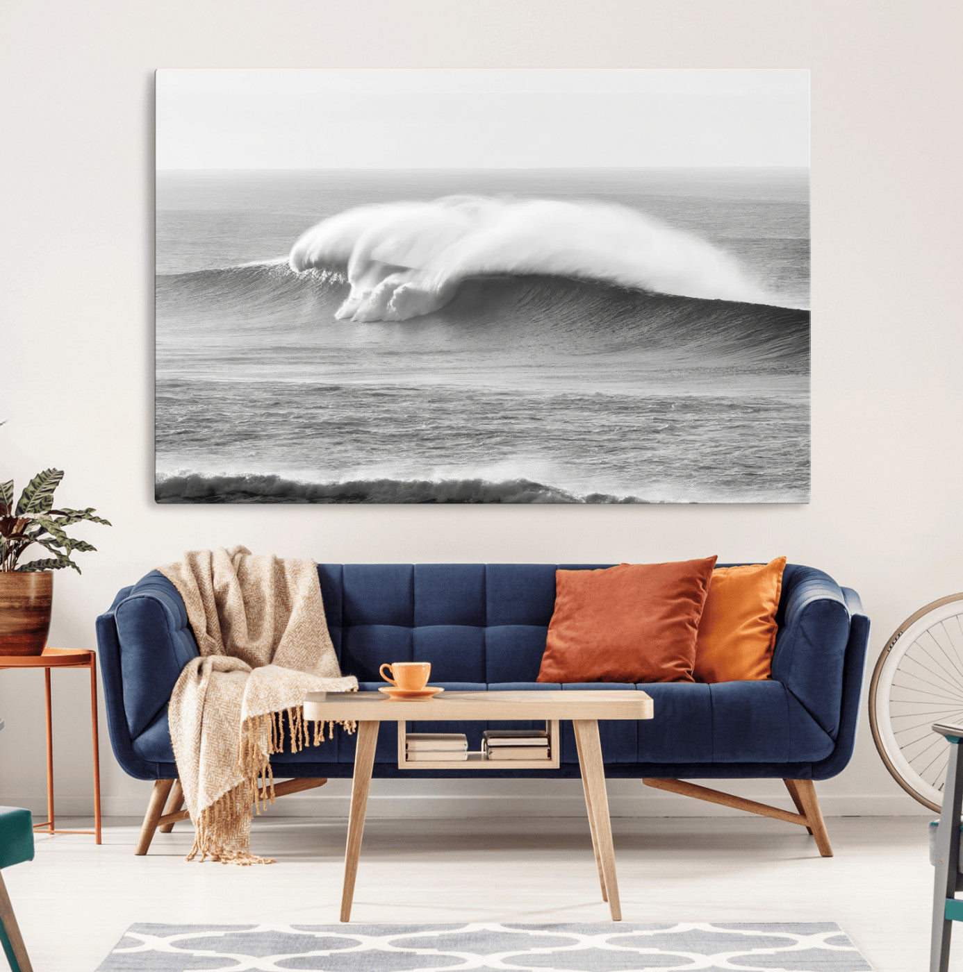 A dramatic black and white ocean wave crashing with immense force, capturing the raw power and movement of the sea in a bold seascape.