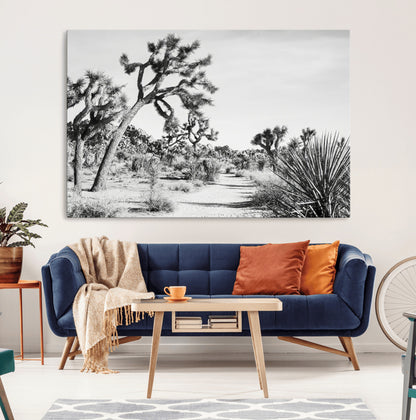 Canvas of a Joshua Tree forest in black and white tones, featuring a desert path and spiky vegetation, ideal for minimalist or rustic decor.