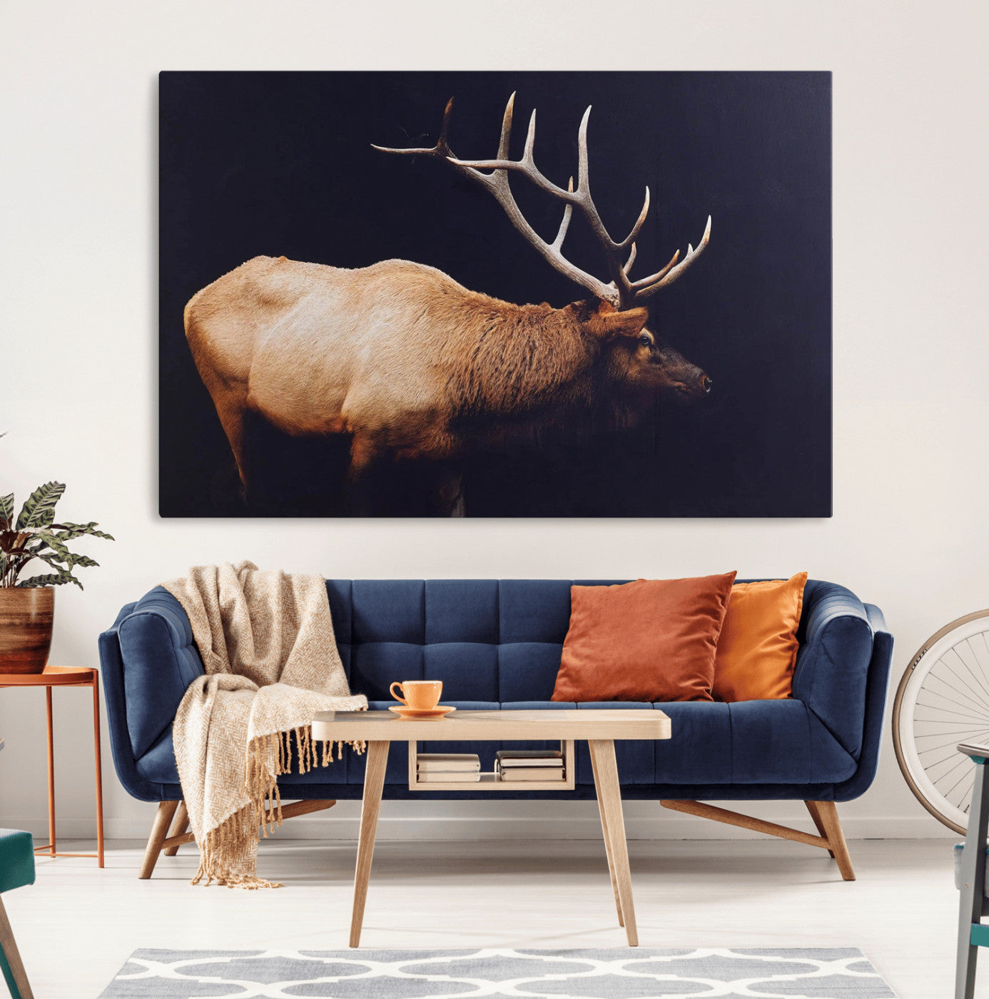 Side profile of an elk with large antlers on dark background, creating a bold rustic statement for cabin or Western-themed decor.