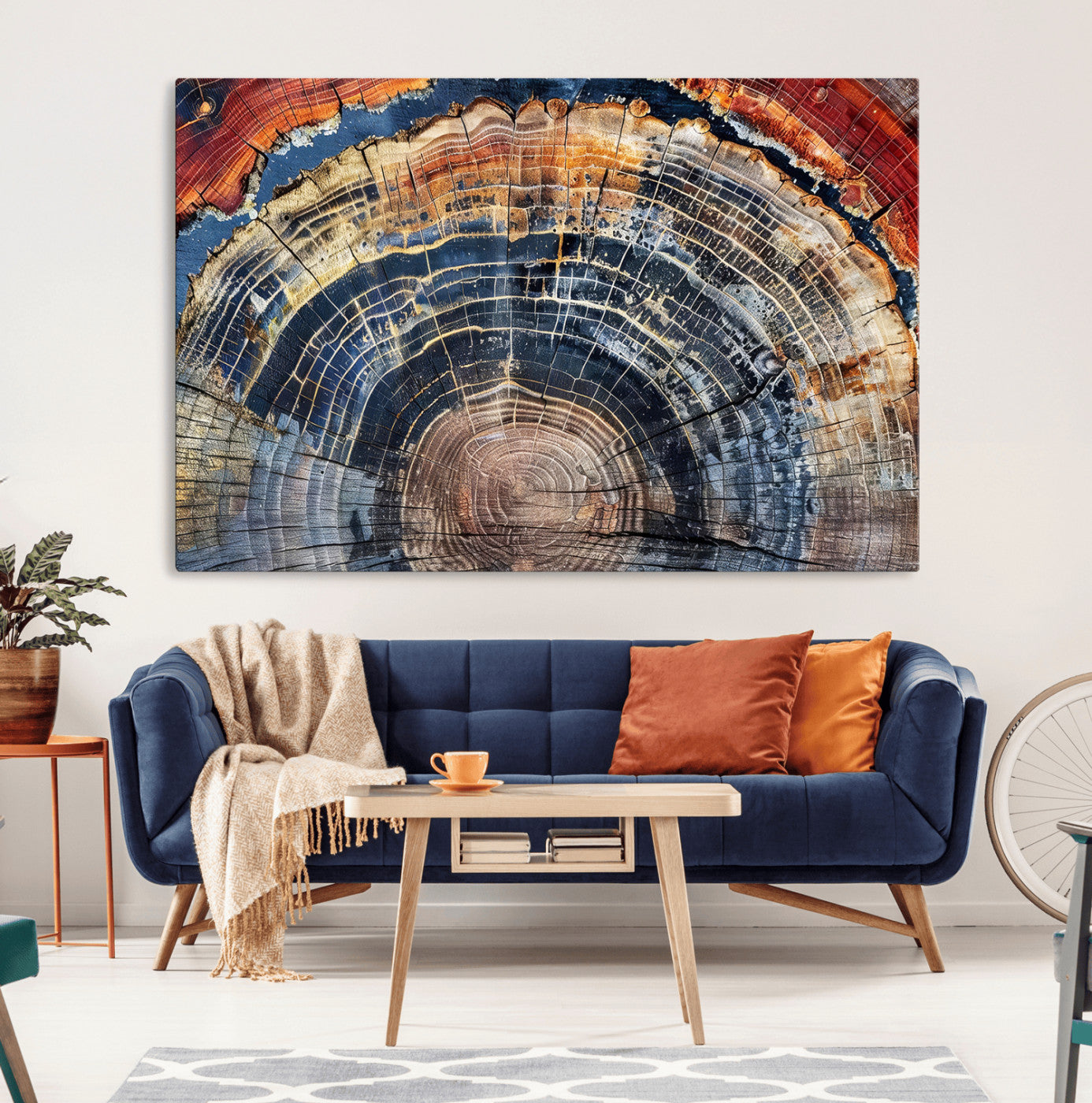Vibrant tree ring with orange, brown, and blue tones in abstract detail, perfect for rustic or boho-inspired wall decor.