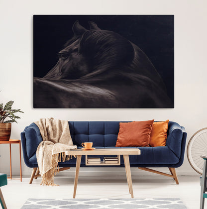 Close-up of a black horse with dramatic lighting on a dark background, perfect for rustic or masculine home decor.