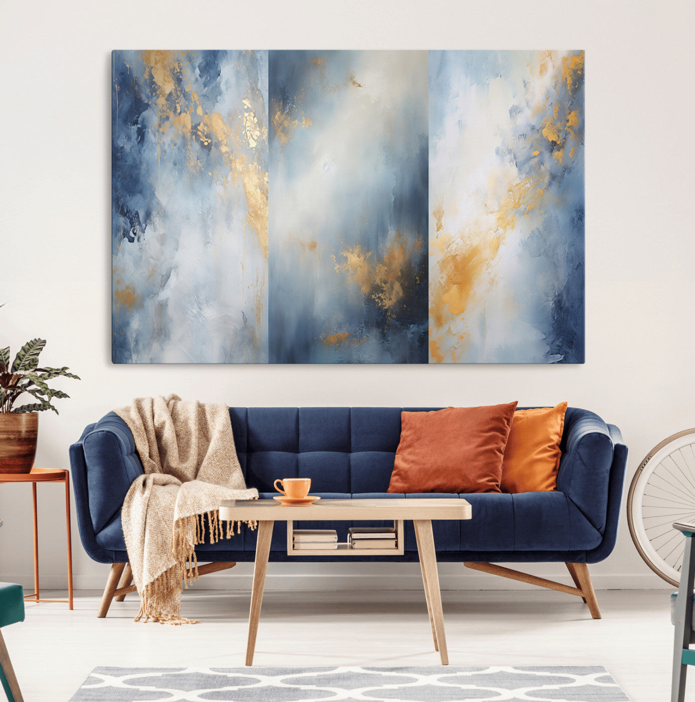Abstract canvas art in soft blue and gold tones with textured brushstrokes, ideal for elegant or modern neutral decor spaces.