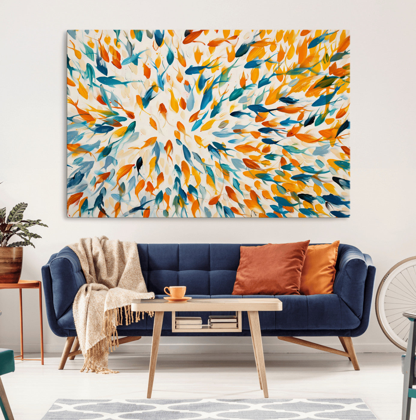 Vibrant abstract canvas of swirling blue and orange fish-like forms, perfect for coastal or playful marine-themed home decor.
