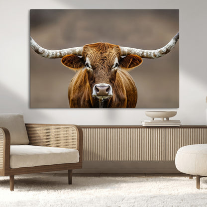 Close-up of a Texas Longhorn with strong curved horns and warm brown tones, perfect for rustic or western-style wall decor.
