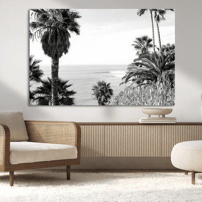 Monochrome canvas of palm trees framing a coastal surf scene, perfect for California-inspired or retro black-and-white beach decor.