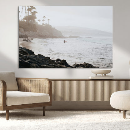 Framed canvas of a surfer in misty coastal tones at a foggy California beach, ideal for minimalist coastal beach or serene ocean-themed decor.