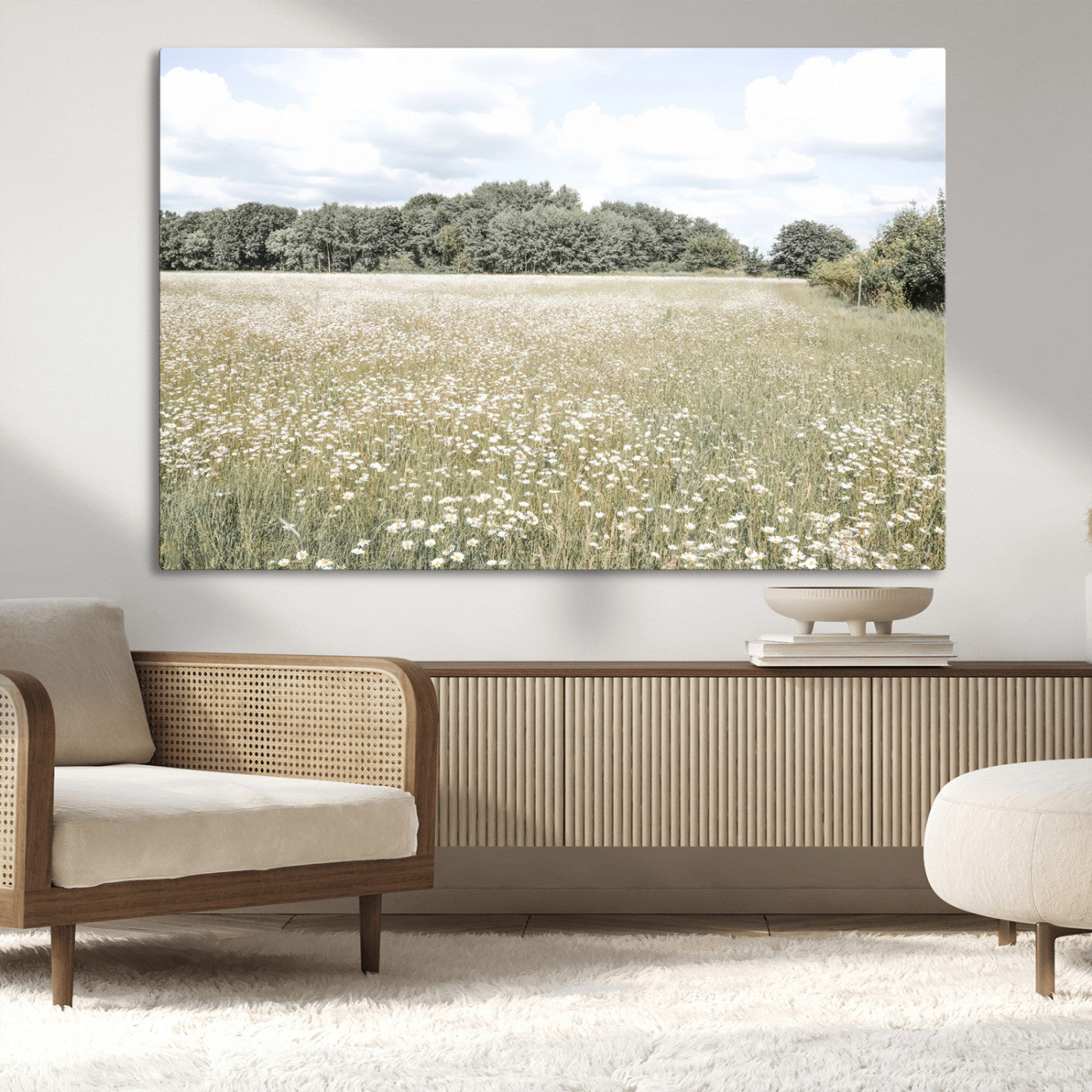 Soft-toned image of a wild daisy field under a cloudy sky, ideal for neutral or Scandinavian-inspired home decor.