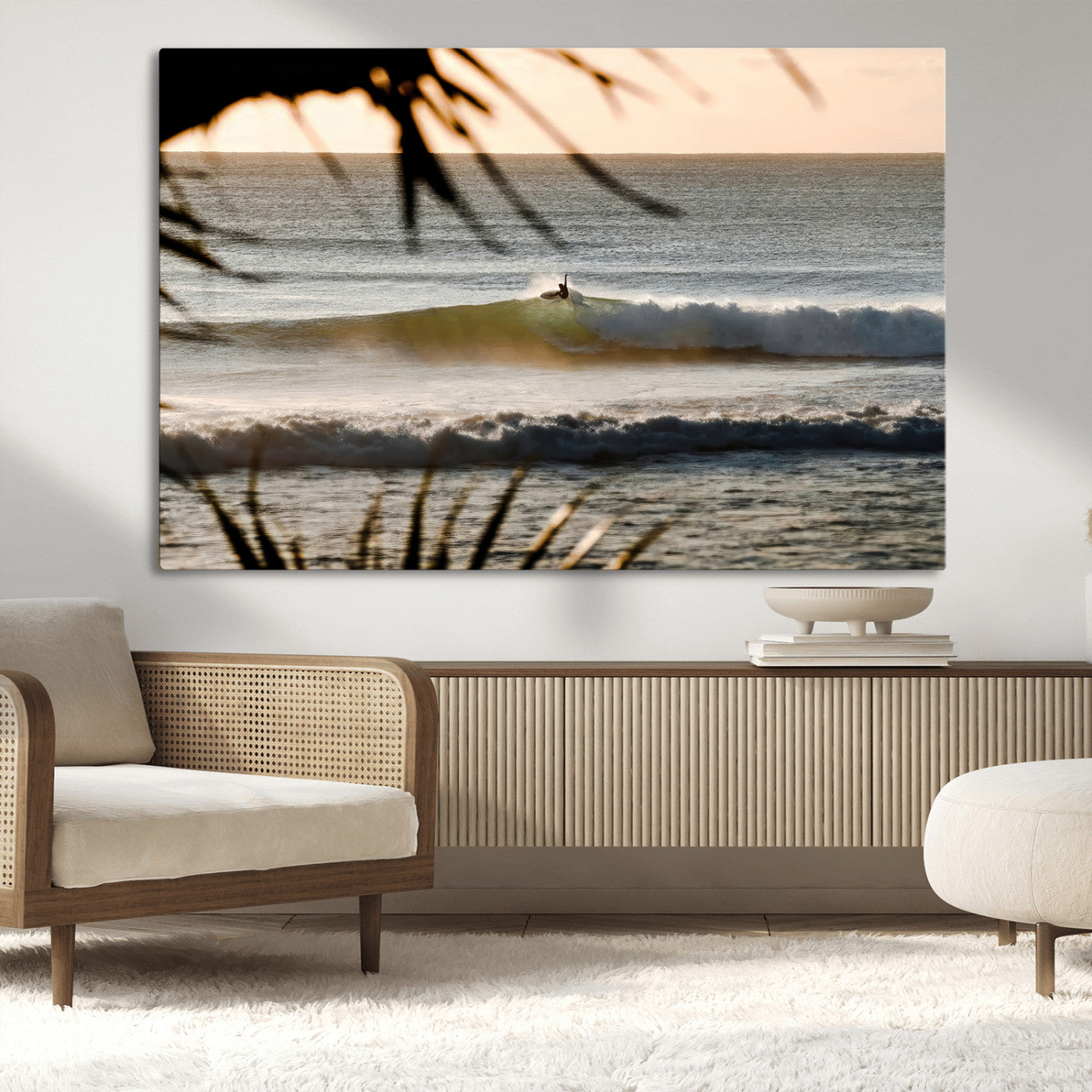 Photo of a surfer riding a golden hour wave at sunset, with tropical tones and dreamy light, perfect for tropical boho or coastal home decor.