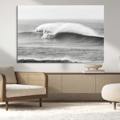 A dramatic black and white ocean wave crashing with immense force, capturing the raw power and movement of the sea in a bold seascape.