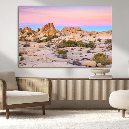 A breathtaking desert landscape featuring rugged rock formations under a vibrant pastel sunset sky, capturing the warmth and serenity of a Southwestern wilderness.