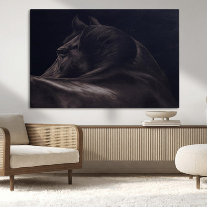 Close-up of a black horse with dramatic lighting on a dark background, perfect for rustic or masculine home decor.