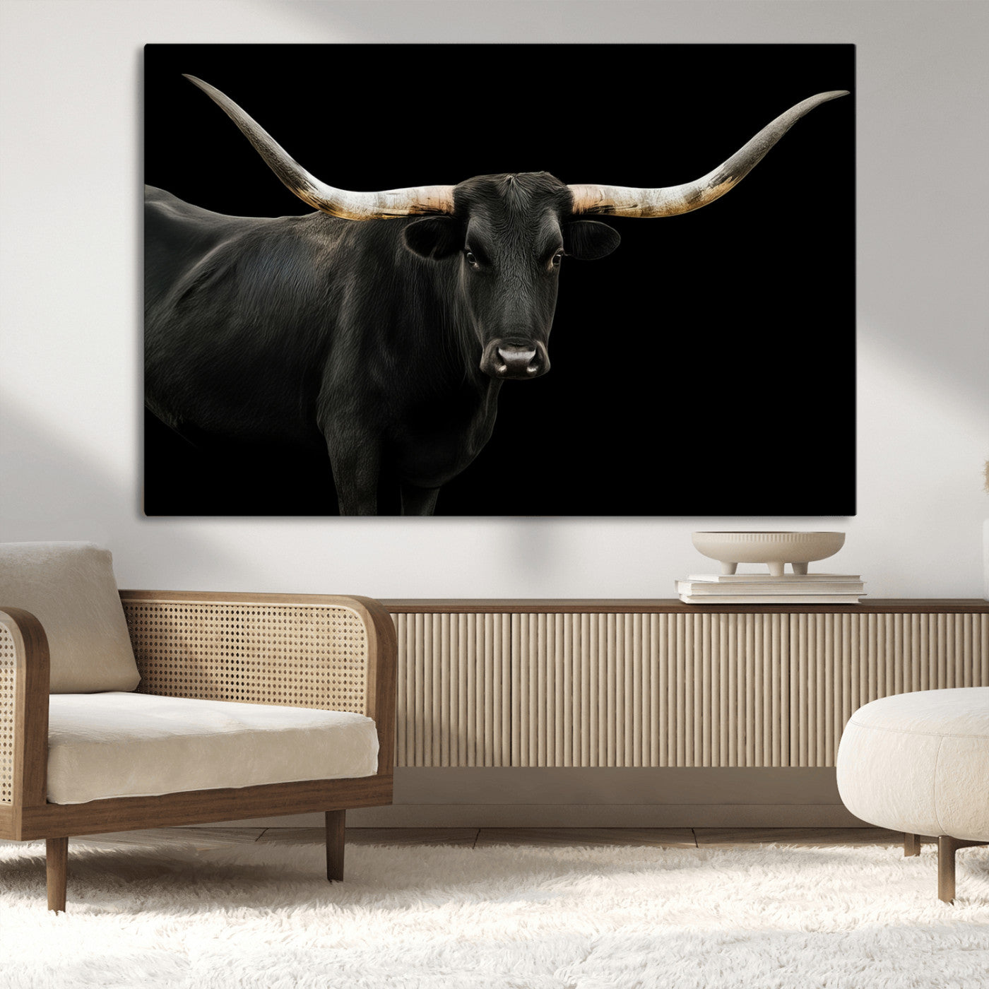 Close-up of a black Texas longhorn with large curved horns on black background, ideal for rustic farmhouse or modern western interiors.