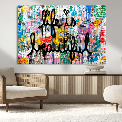 Colorful urban-style canvas with graffiti text “Life is Beautiful” in black paint, ideal for bold or street-themed home decor.