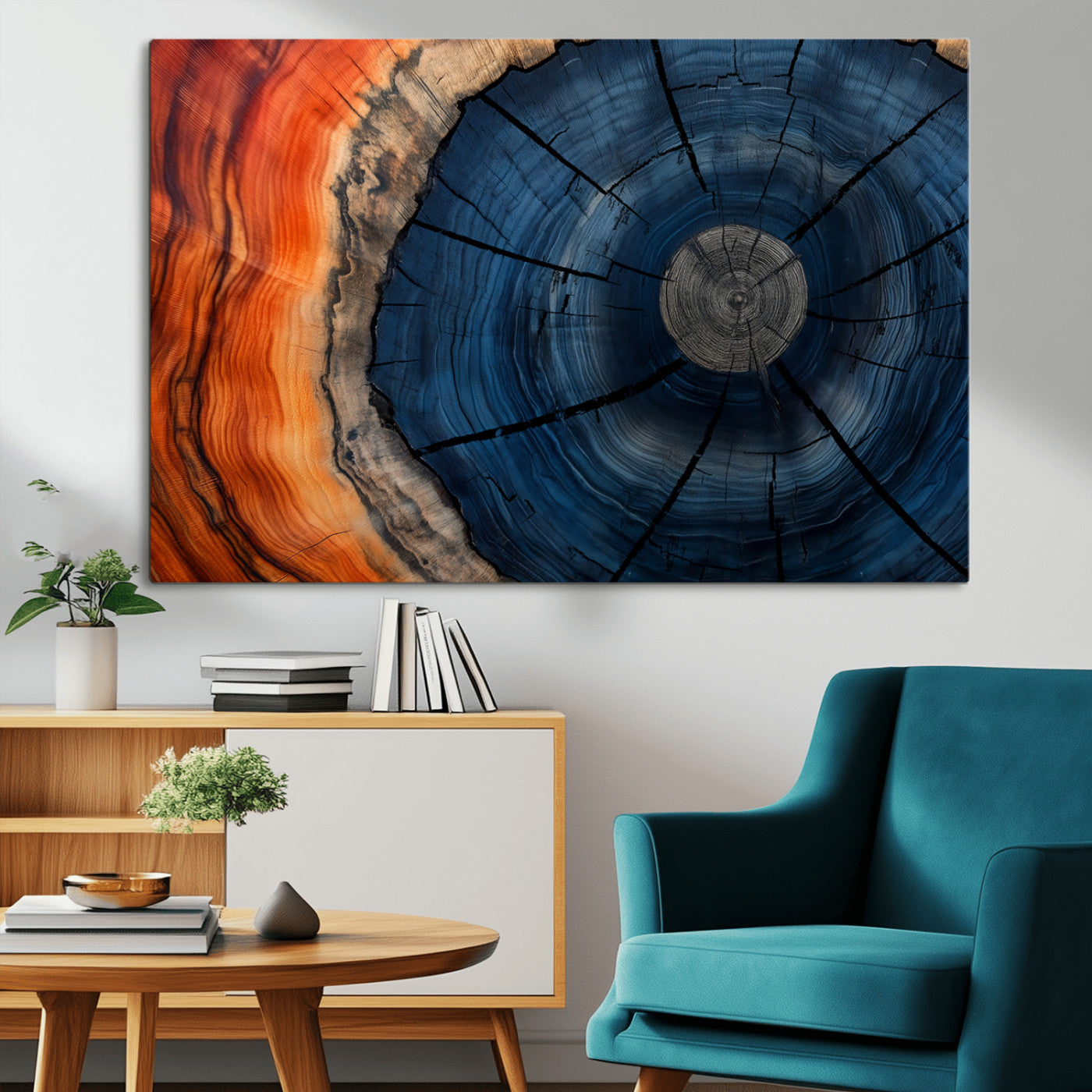 A captivating close-up of a tree trunk, showcasing its concentric rings in rich shades of blue, orange, and brown, highlighting the organic patterns of natural wood.