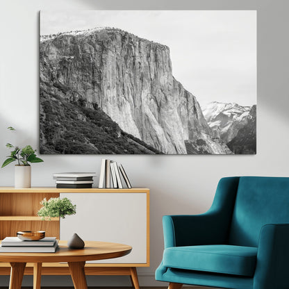 Monochrome canvas of El Capitan’s granite wall in Yosemite with snowy peaks, ideal for dramatic mountain or black-and-white nature decor.