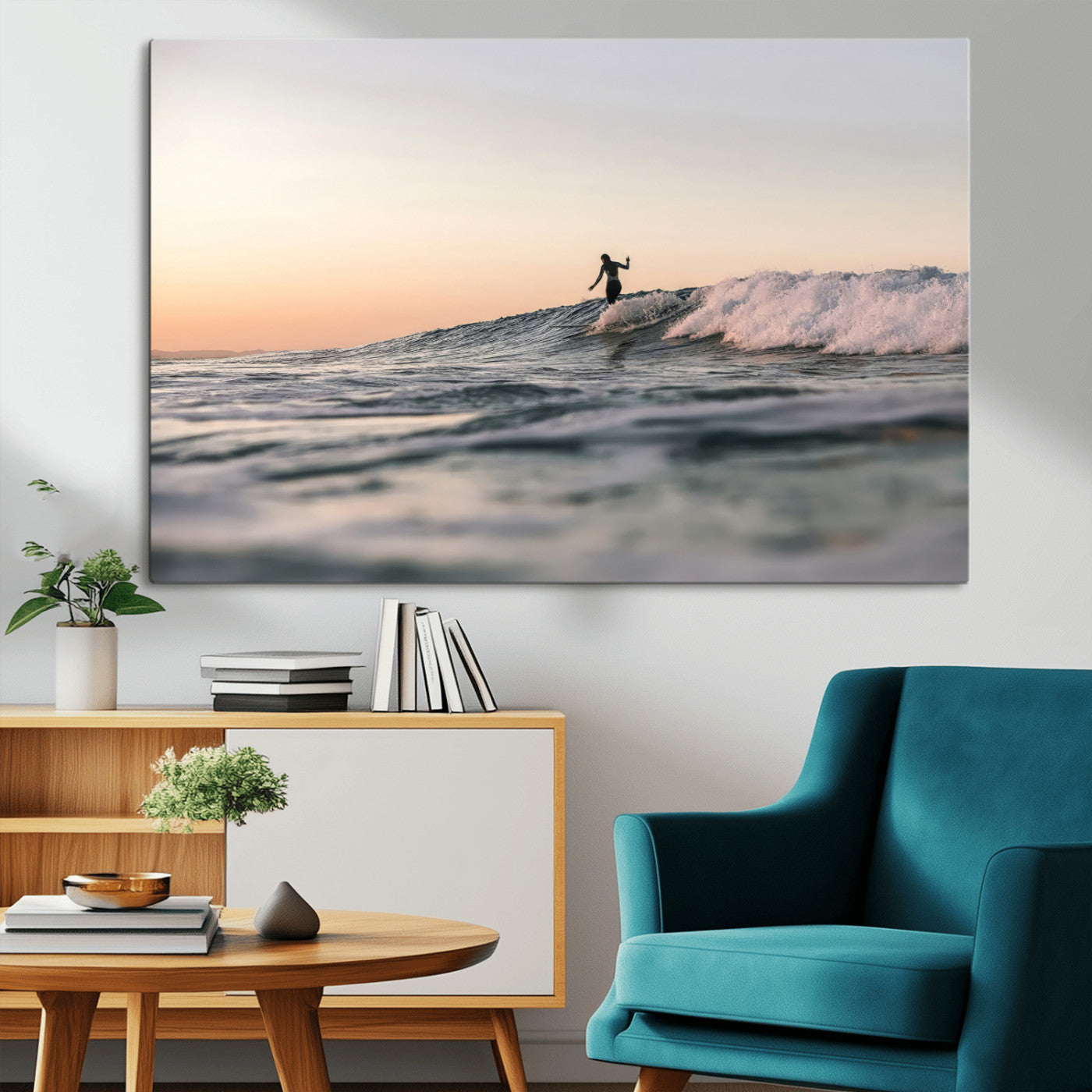 Framed canvas of a female surfer balancing on a wave at sunset, perfect for serene surf or ocean-inspired coastal decor.