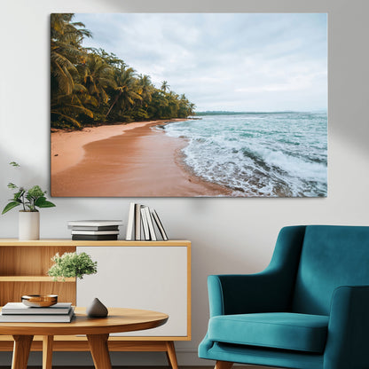 Framed canvas of a tropical beach with palm trees and soft waves, ideal for coastal escape or serene nature-inspired home decor.