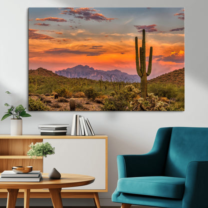 Vibrant desert sunset with saguaro cacti and distant mountains, perfect for Southwestern or warm-toned home decor.