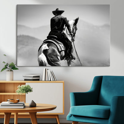 Black and white canvas of a cowboy on horseback with moody tones, perfect for rustic western or country-inspired home decor.