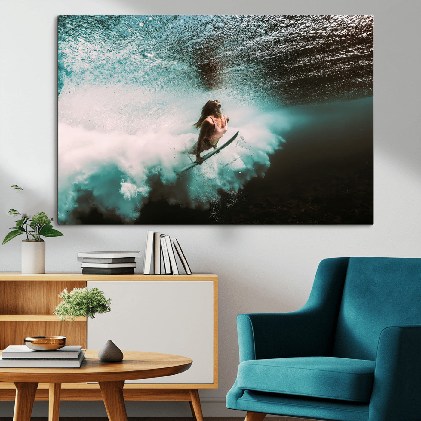 Vibrant underwater photo of a female surfer diving through turquoise waves, perfect for coastal boho or surf-inspired home decor.