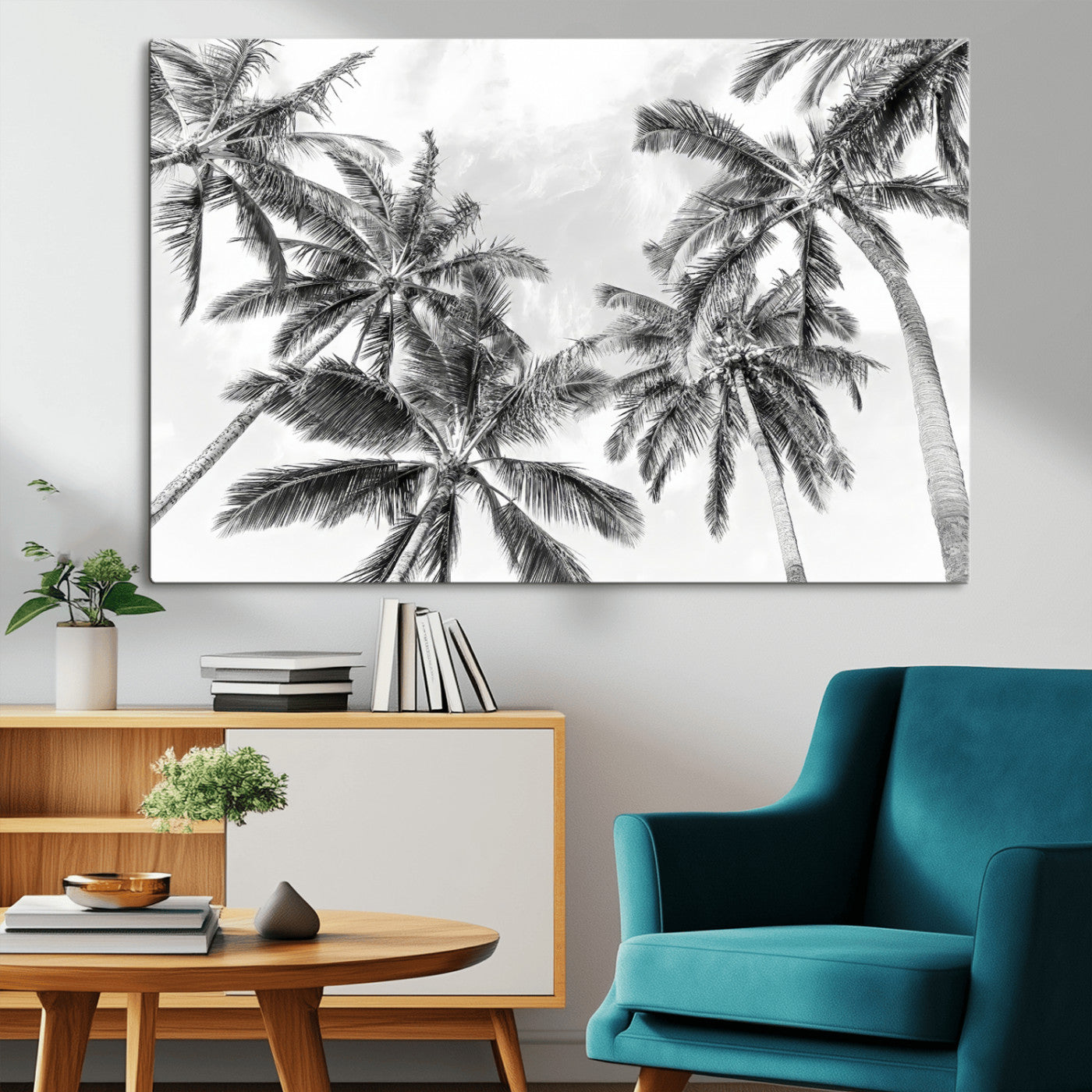 Black and white tropical palm trees viewed from below, swaying gently against a bright sky, creating a serene and elegant coastal atmosphere.
