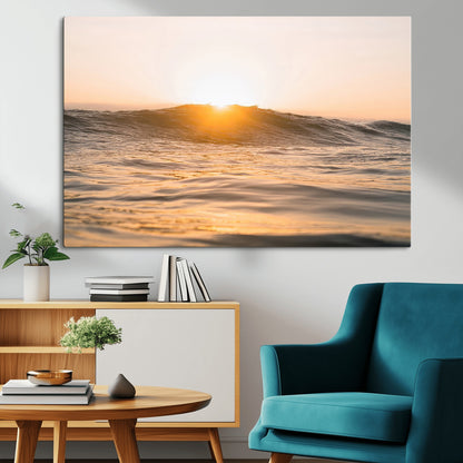 Ocean waves glowing under a warm golden sunset, reflecting soft light and calm movement, perfect for warm minimalist coastal interiors.