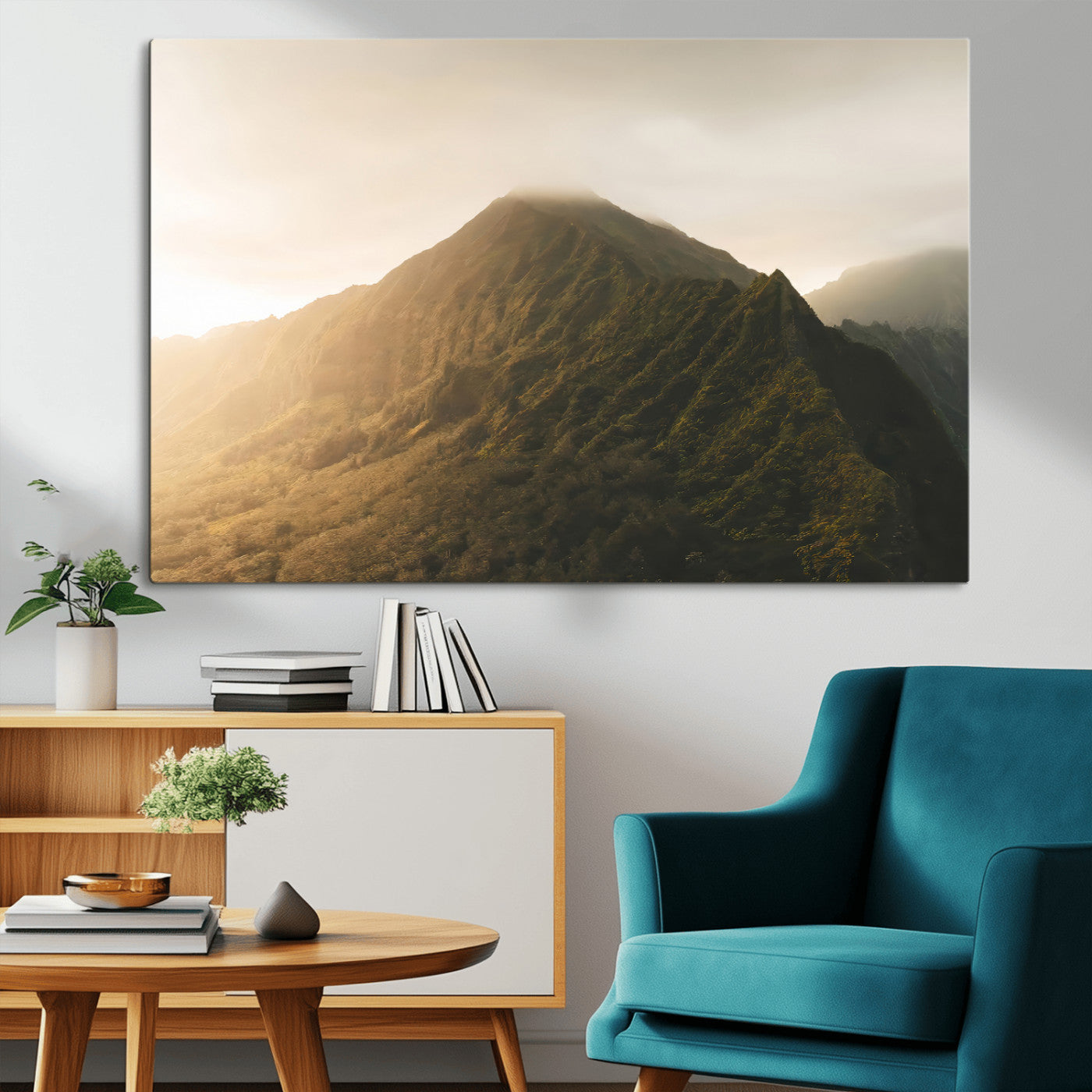 Sunlit mountain peak with mist rolling over its rugged slopes, bathed in golden light, creating a warm and tranquil nature-inspired scene.
