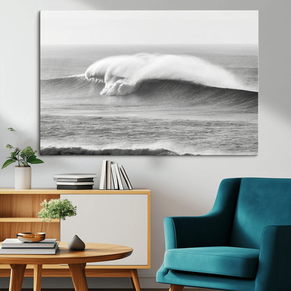 A dramatic black and white ocean wave crashing with immense force, capturing the raw power and movement of the sea in a bold seascape.