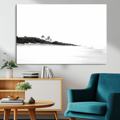 A black and white minimalist coastal scene with a vast open beach, distant palm trees, and a lone figure walking along the shoreline, evoking serenity and solitude.
