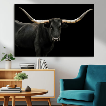Close-up of a black Texas longhorn with large curved horns on black background, ideal for rustic farmhouse or modern western interiors.