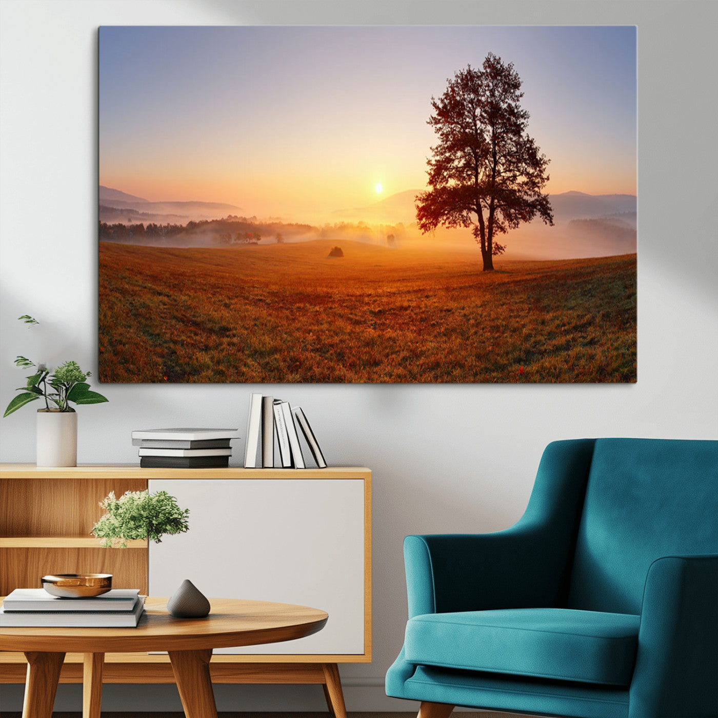 A tranquil landscape at sunrise with a mist-covered field and a lone tree, creating a peaceful and natural atmosphere.