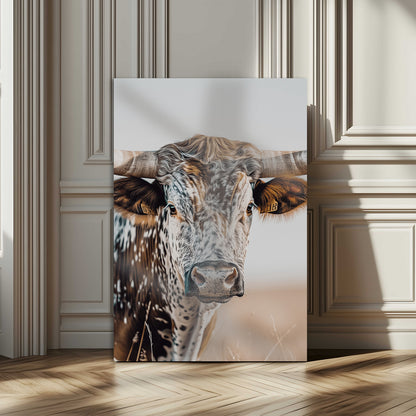 Canvas of a speckled Texas longhorn with wide curved horns and warm tones, perfect for rustic or country-style wall decor.