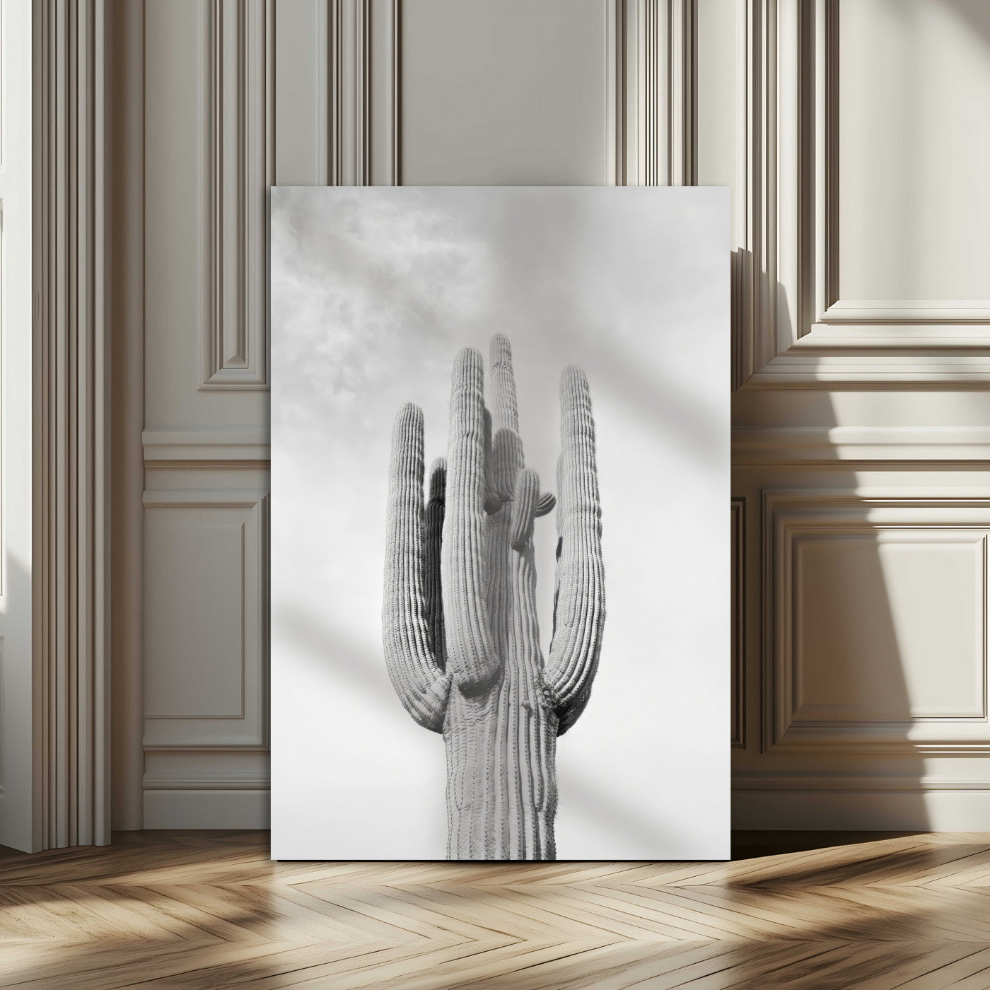 Canvas of a tall saguaro cactus in black and white with moody tones, perfect for southwestern minimalist or modern desert-themed home decor.
