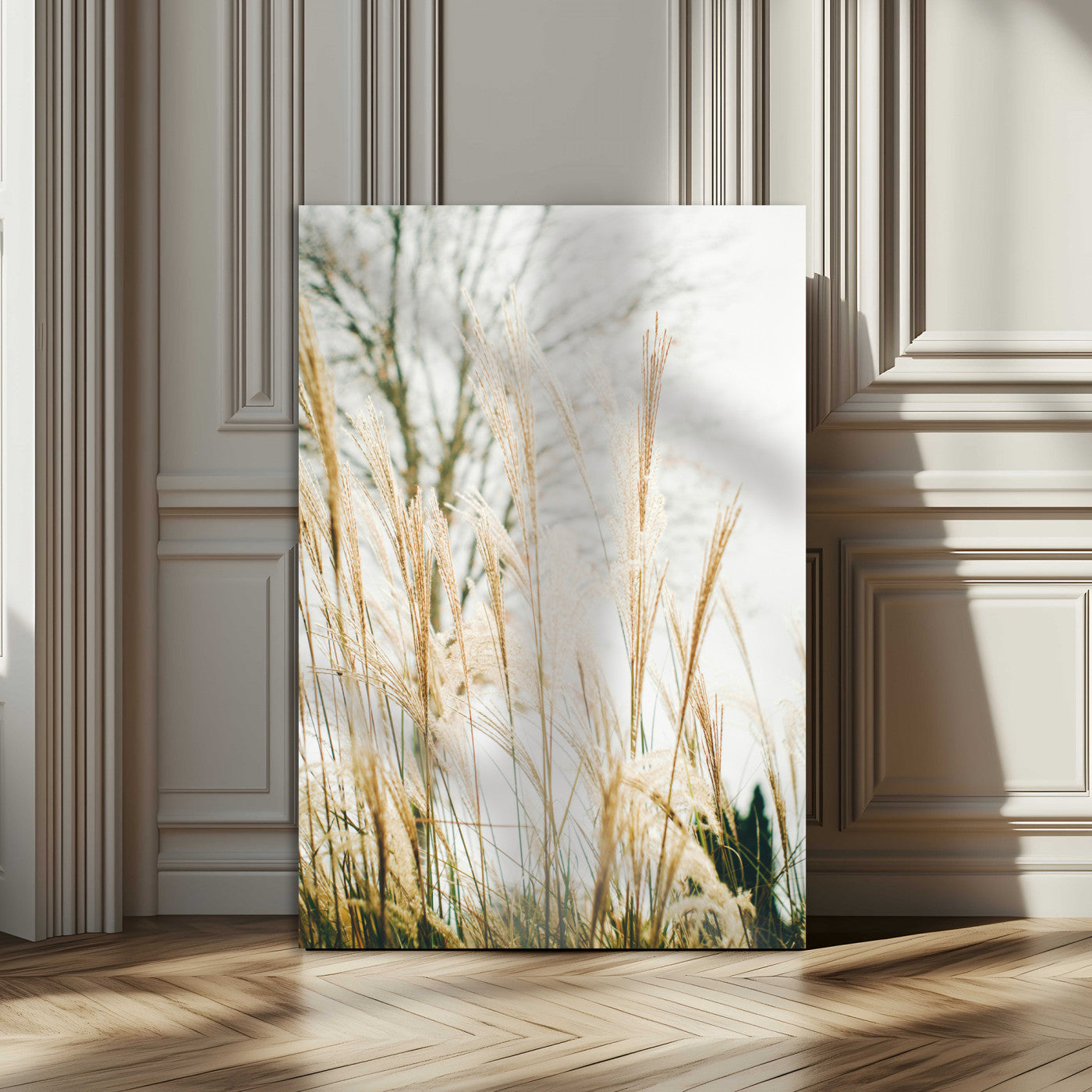 Soft beige pampas grass swaying in the breeze against a muted sky, creating a tranquil and minimalist botanical aesthetic.