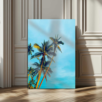 "Tall palm trees with golden sunlight against a vibrant blue sky, creating a tropical, relaxing atmosphere for coastal and beach-themed decor.