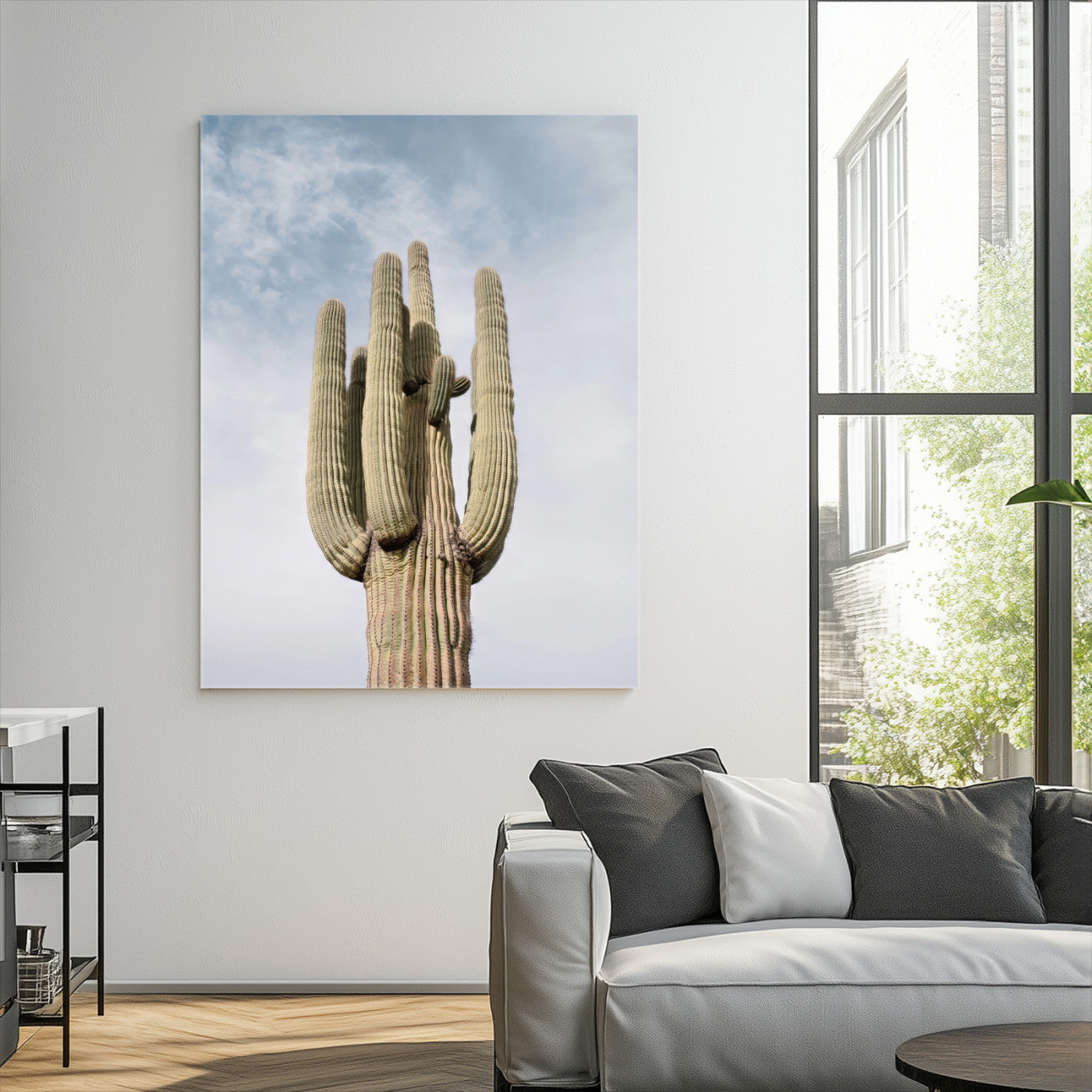 Vertical photo of a tall saguaro cactus against a soft sky, ideal for earthy or Southwestern home decor with warm neutral tones.