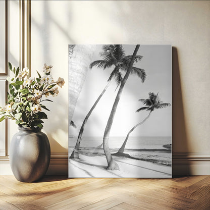 Black and white wall art of palm trees and a hammock on a beach, ideal for coastal minimalist or tropical-themed decor.