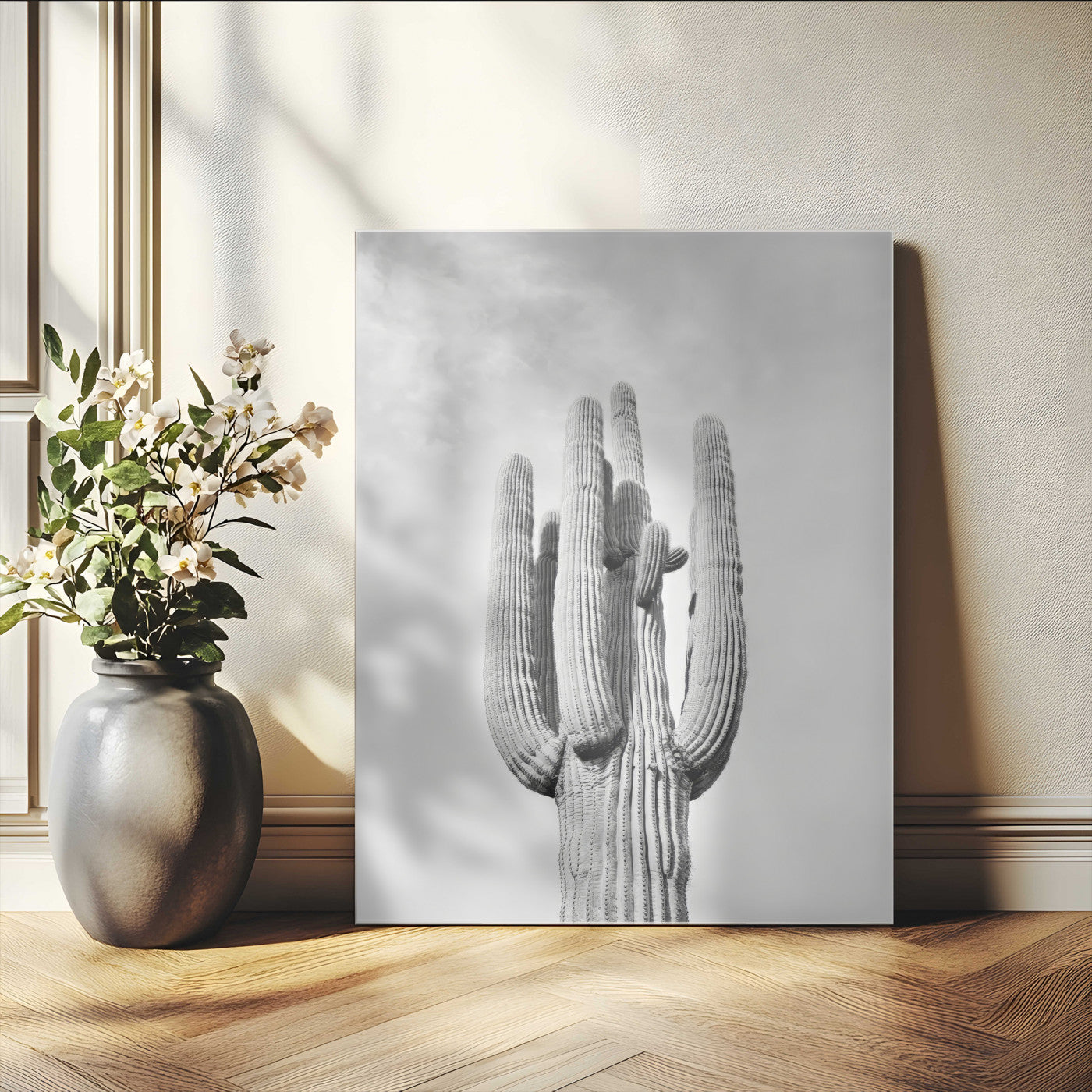 Canvas of a tall saguaro cactus in black and white with moody tones, perfect for southwestern minimalist or modern desert-themed home decor.