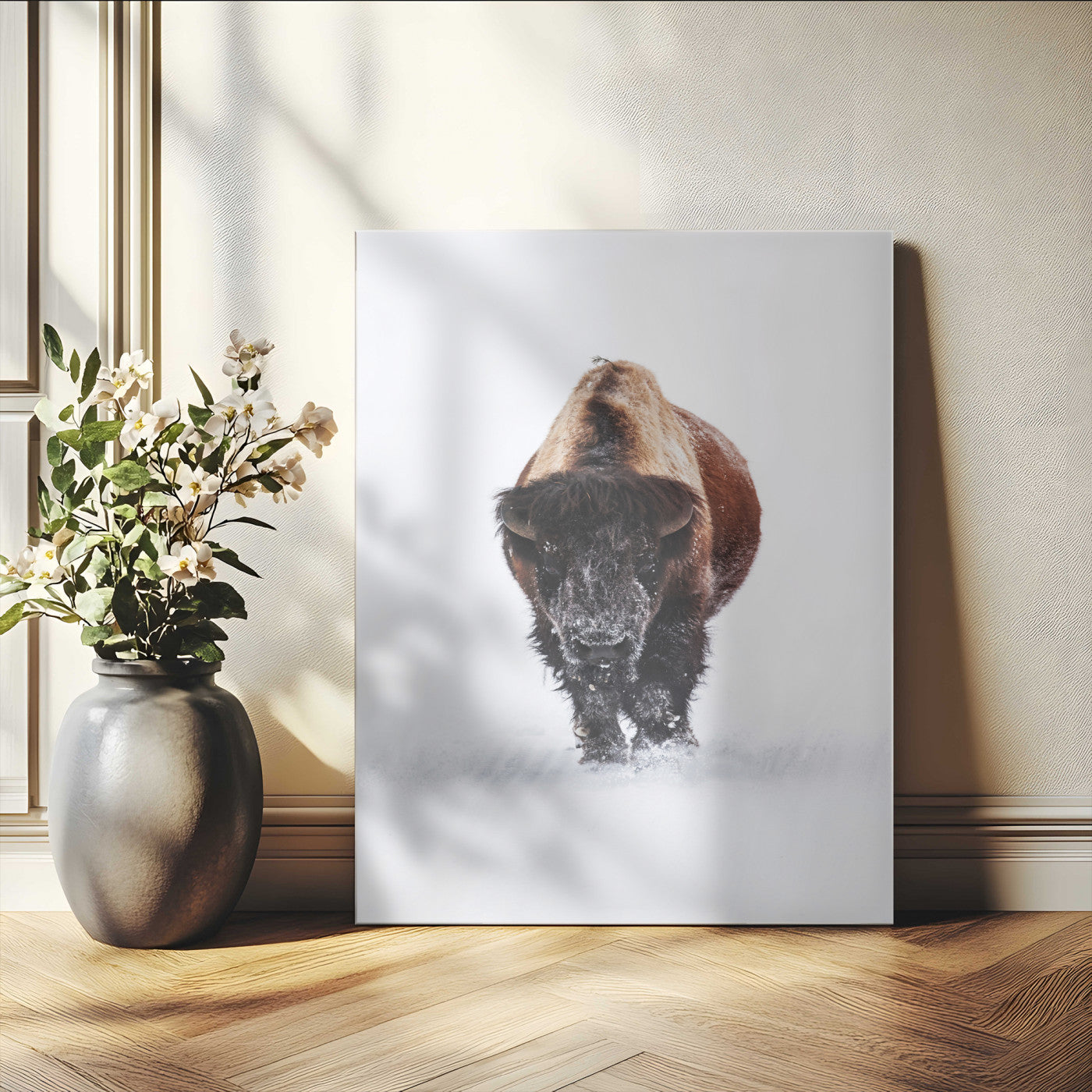 Front view of a strong bison walking in deep snow, isolated white background, perfect for rustic or lodge-style home decor.