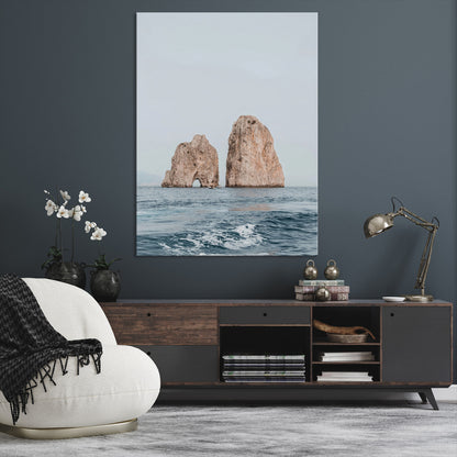 Serene photograph of the Faraglioni rocks in Capri with calm blue waters, perfect for Mediterranean coastal or minimalist travel-themed decor.